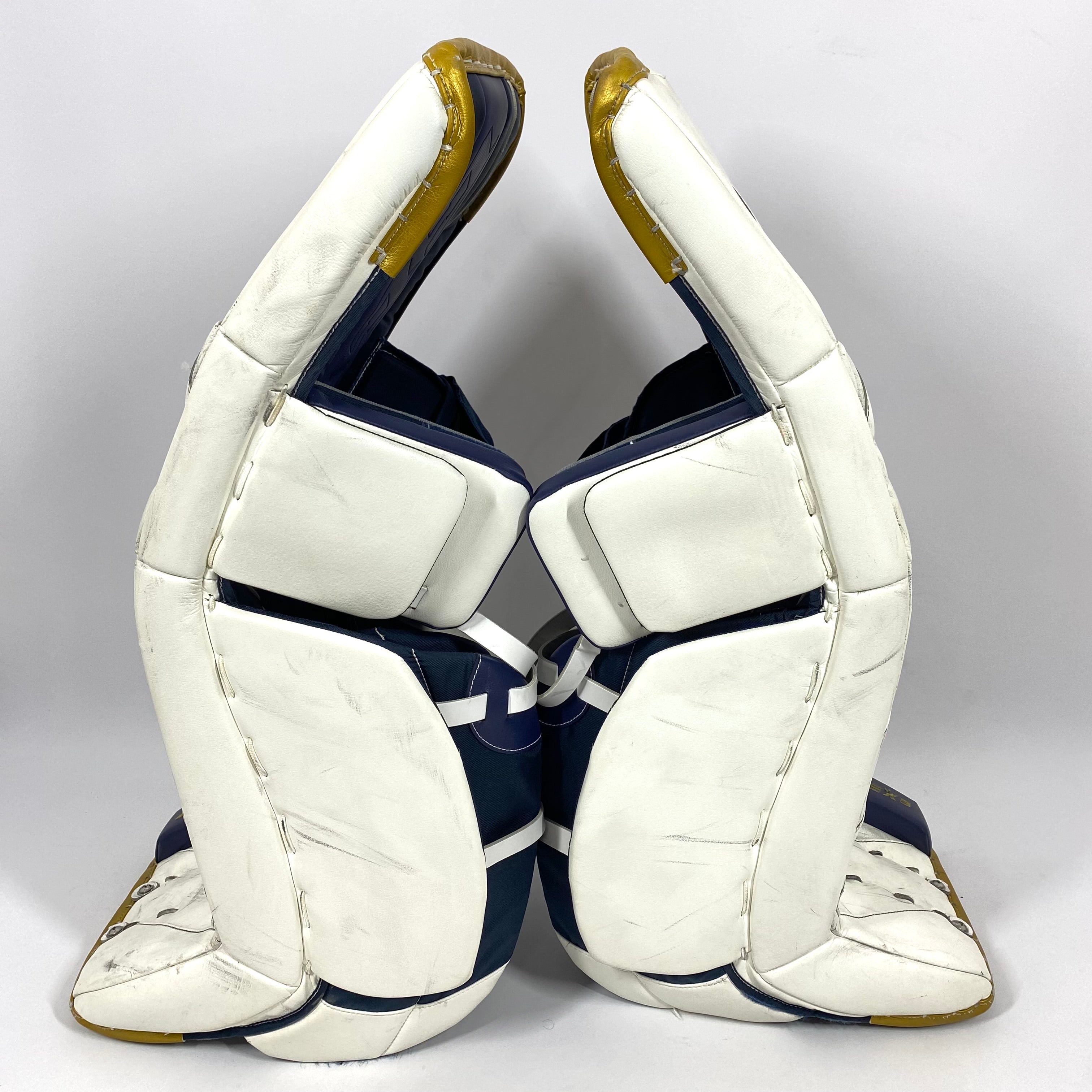Extreme Flex 5 - Used NCAA Pro Stock Goalie Pads (White/Blue/Gold)